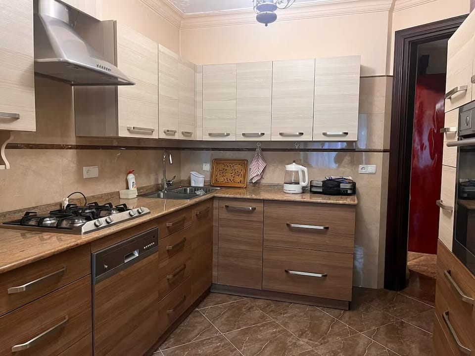 A large kitchen full of necessary equipment.