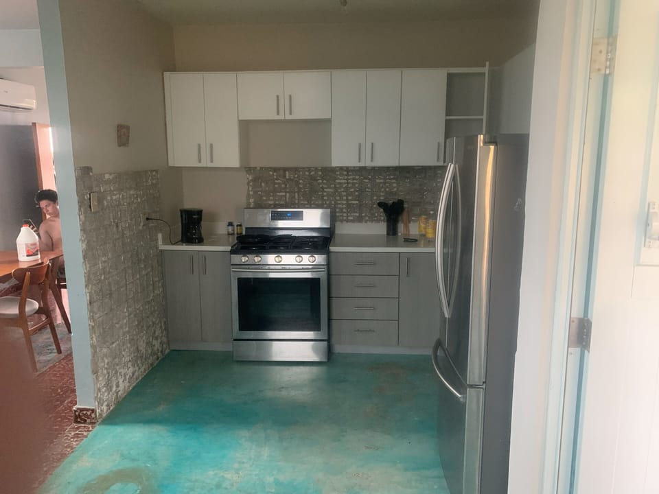 Clean and functional this kitchen has all the basics for comfortable cooking