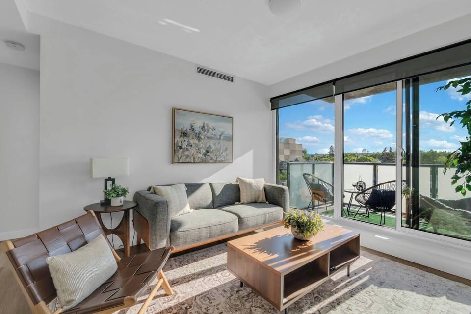 Cozy living room with a 65" Smart TV and immersive home theatre system