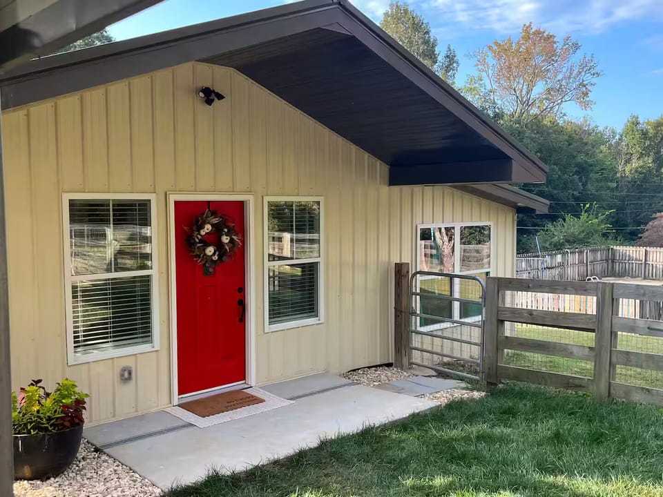 Private entrance with fenced easy access to yard, deck, pool, and firepit