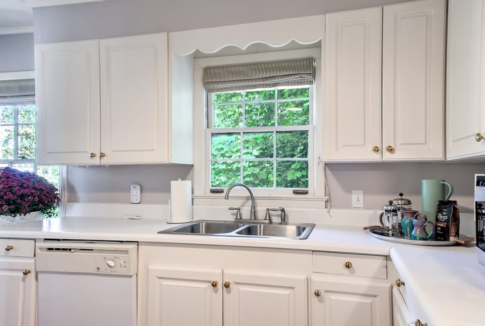 Double stainless-steel sinks and a full dishwasher make cleanup a breeze.