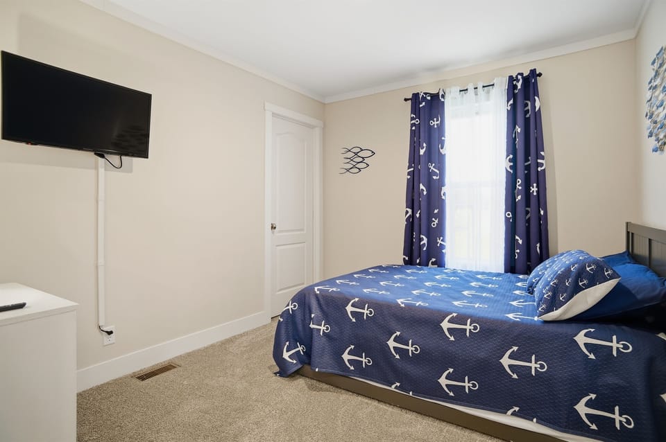 Bedroom #2 with 1 double bed and a double-sized trundle as well for plenty of extra sleeping space.