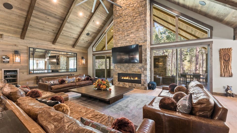 Living room 1: Main floor, gas fireplace, Smart TV, vaulted ceilings, deck access