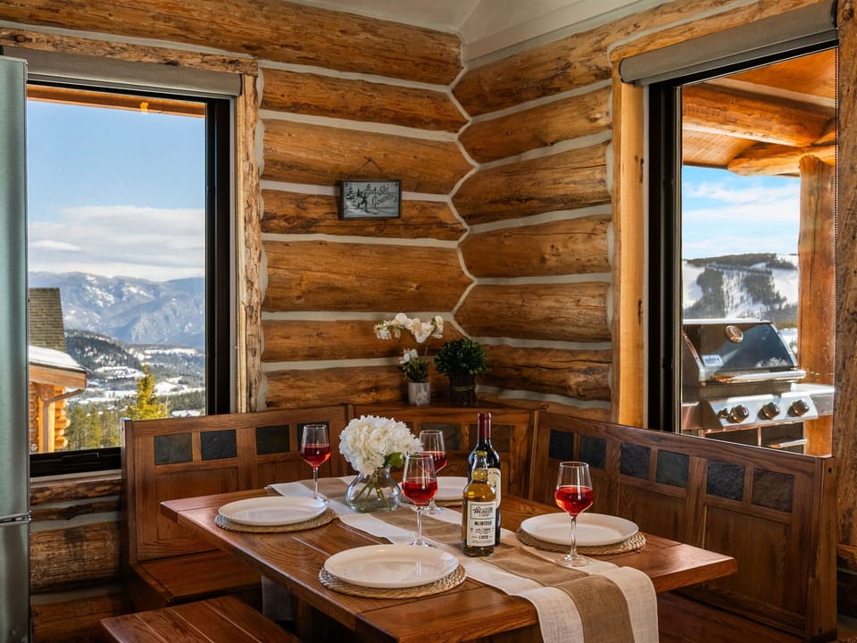 Dining area: Table seating for 5, adjacent to kitchen
