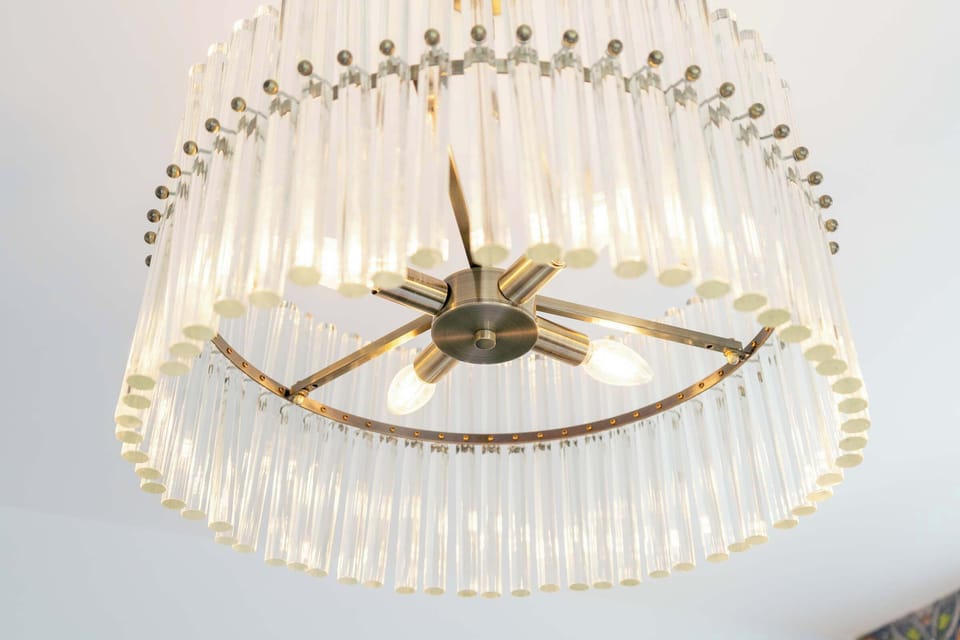 Elevate your Nashville stay with this stunning chandelier that exudes luxury. Imagine sipping cocktails beneath its glow after exploring vibrant downtown—perfect for family reunions or chic bachelorette parties. Experience Music City in style!