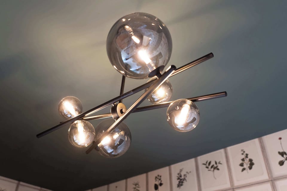 Illuminate your Nashville getaway with stunning decor that blends modern elegance and comfort. Perfect for large groups or a family reunion, this space by Misfit Homes is your luxe escape. Reserve your stay today!