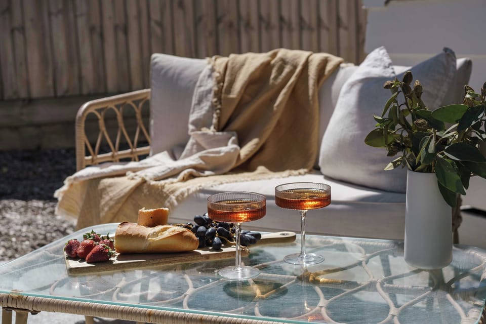 Enjoy a glass of wine and grazing board in the afternoon sun