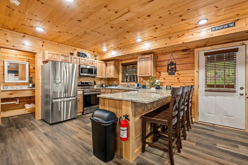 Easy place to prep meals, snack, or hang out around the island.