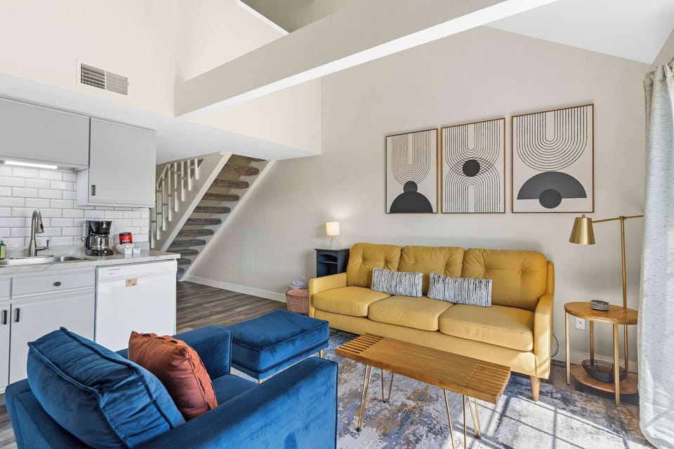 Curl up in the airy living room & stream your favorites on the smart TV​