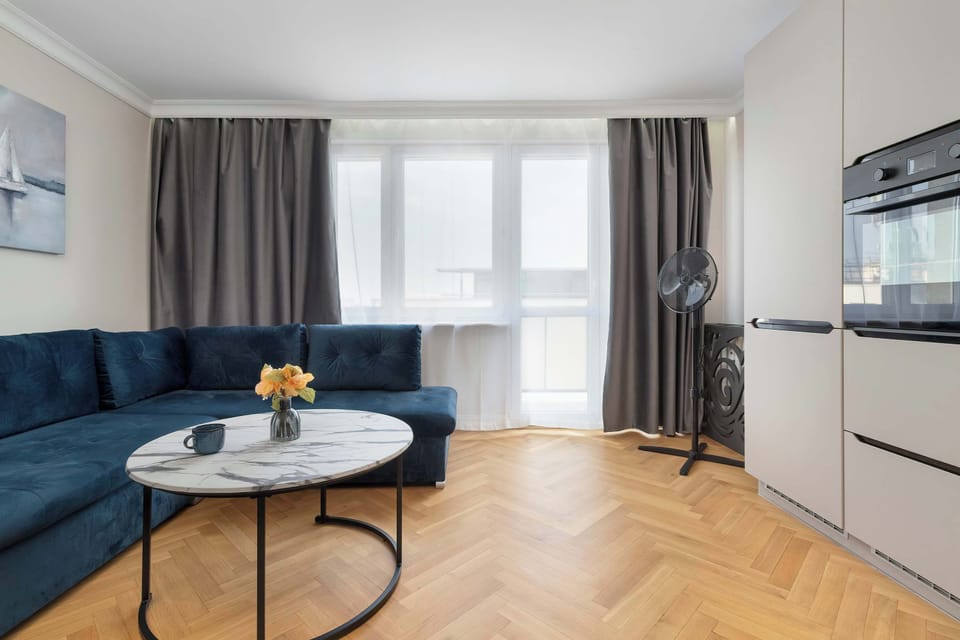 The living room offers a perfect blend of comfort and modern style.