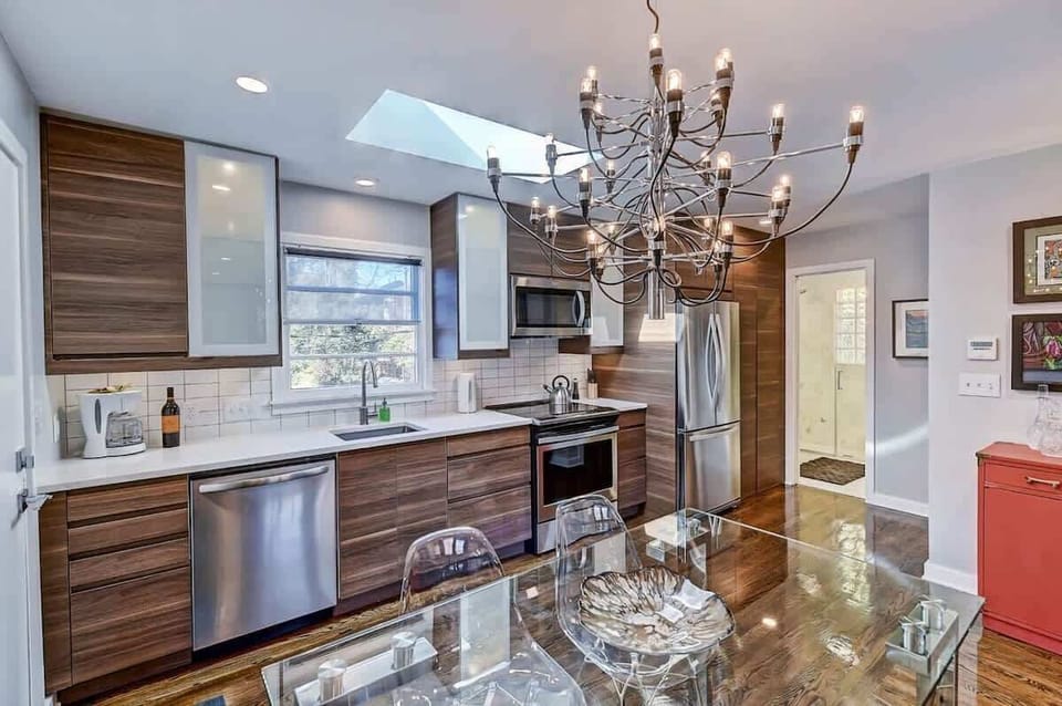 Cook like a pro in our fully equipped kitchen featuring sleek stainless steel appliances and a gas range.