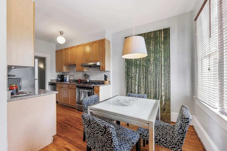 Dining space perfect for meals, remote work, or enjoying coffee with free Wi-Fi.