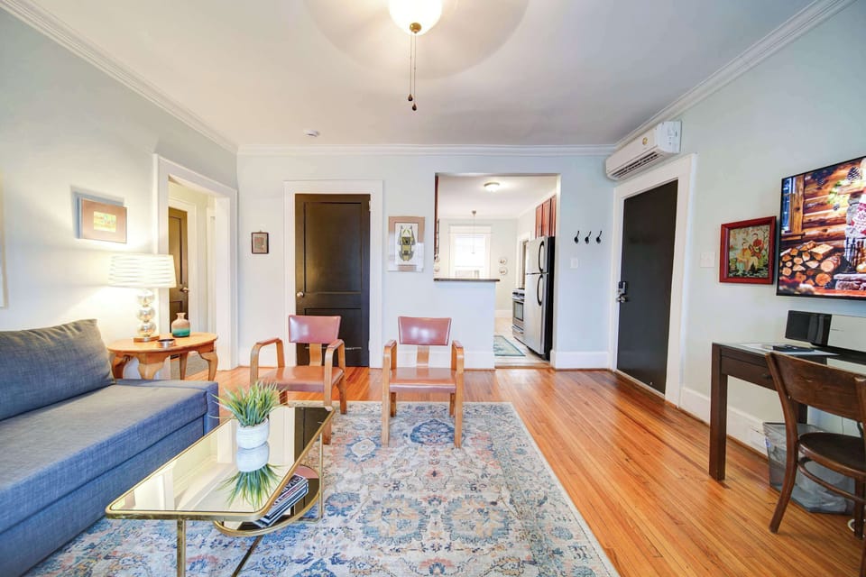 A welcoming living room designed for comfort, whether you're relaxing or catching up on work.