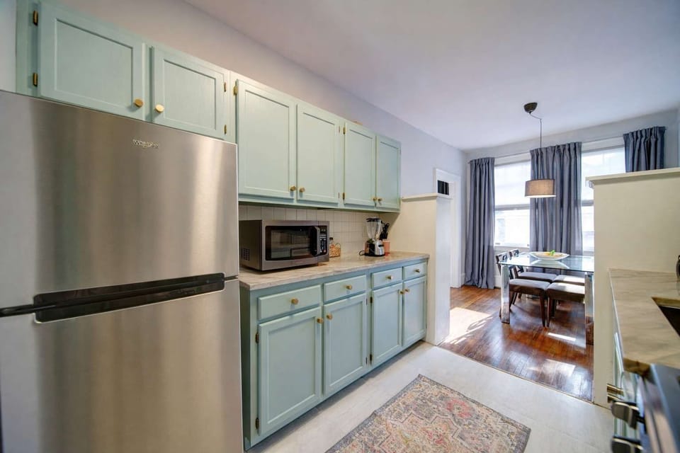 Fully equipped kitchen with essential cookware, ideal for short visits or long-term stays.