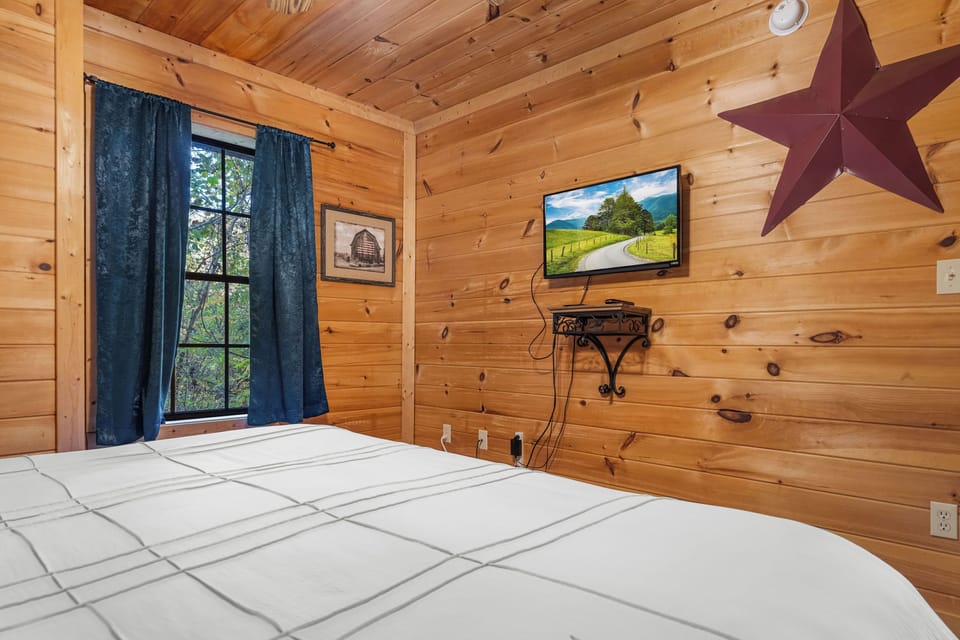 Lower-level king bedroom with ensuite & jetted tub