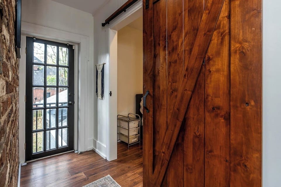 Sliding door to the Photographer's Suite and view of the backyard. (Only accessible to guests of the Bell-Smith Suite)