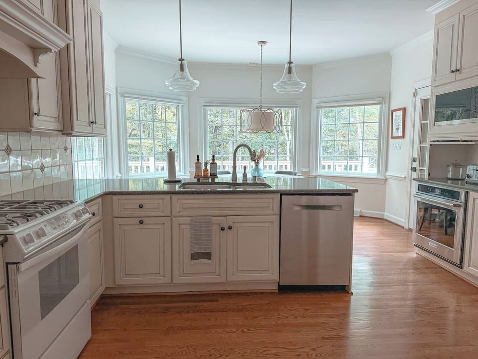 Kitchen equipped with: pots, pans, spices, dishware, gas stove, oven, dishwasher, microwave, and more!