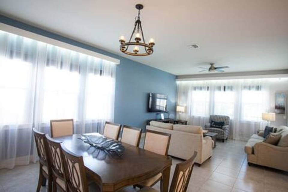 Spacious living and dining area, perfect for relaxation and quality time.