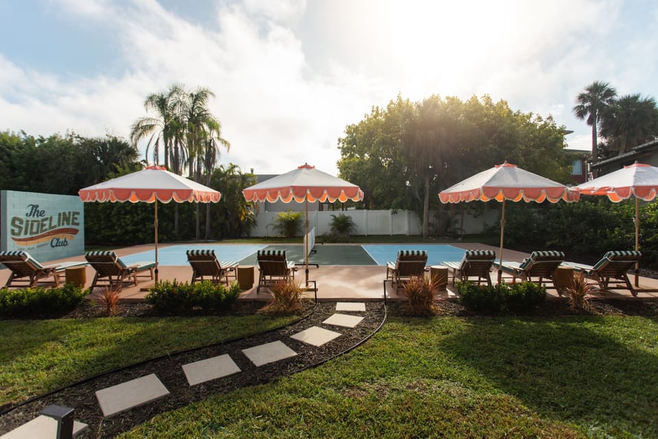 Play hard. Lounge Harder. Private pickleball court with 8-ft wall ball wall, shaded sideline loungers & throwback umbrellas. A sun-soaked space to rally, relax & recharge between games.