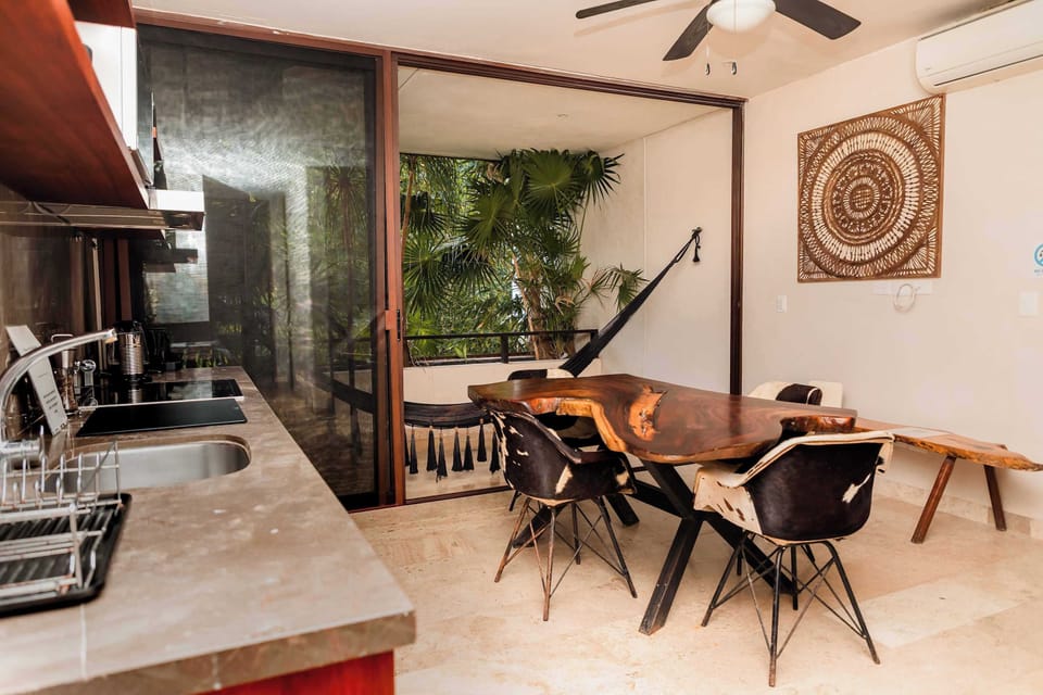 Dining Room, Equipped Kitchen and Downstairs Terrace