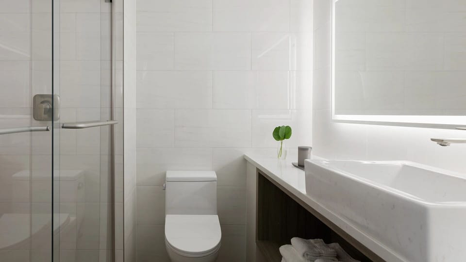 Refresh in a sleek, spa-like bath with glass shower.