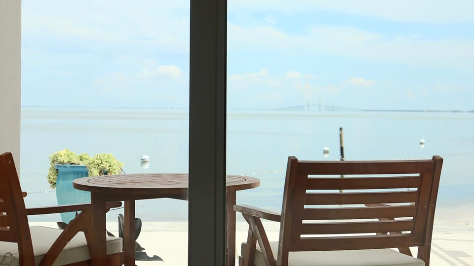 Sip morning coffee on the balcony with endless water views.