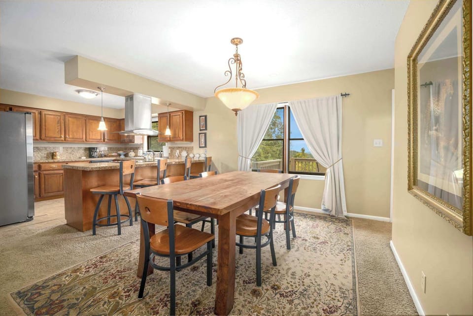 Whip up a delicious meal in the fully stocked kitchen and share it together in the dining room.