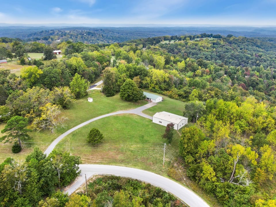 Spend time outside in the serene tree-filled acreage!