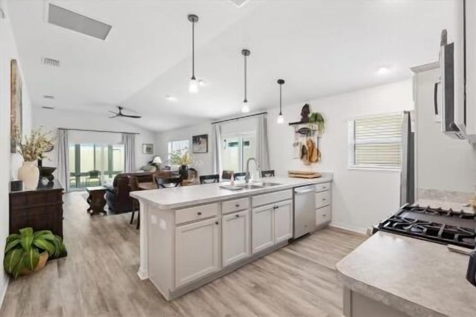 Kitchen w/ Stainless Steel Appliances, including a Dishwasher 