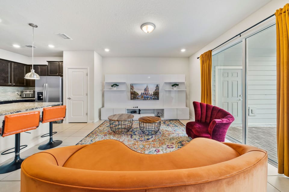 Bright and modern lounge area — designed for comfort and connection during your vacation