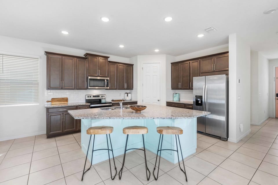 Start your mornings with coffee or a quick meal in this clean, well-lit kitchen