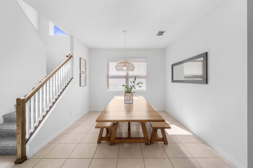Share family dinners with a relaxing view of the private pool just outside