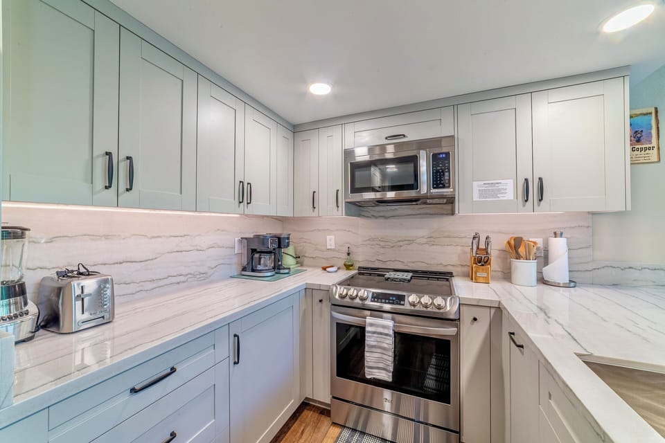 Kitchen has upgraded stainless steel appliances.
