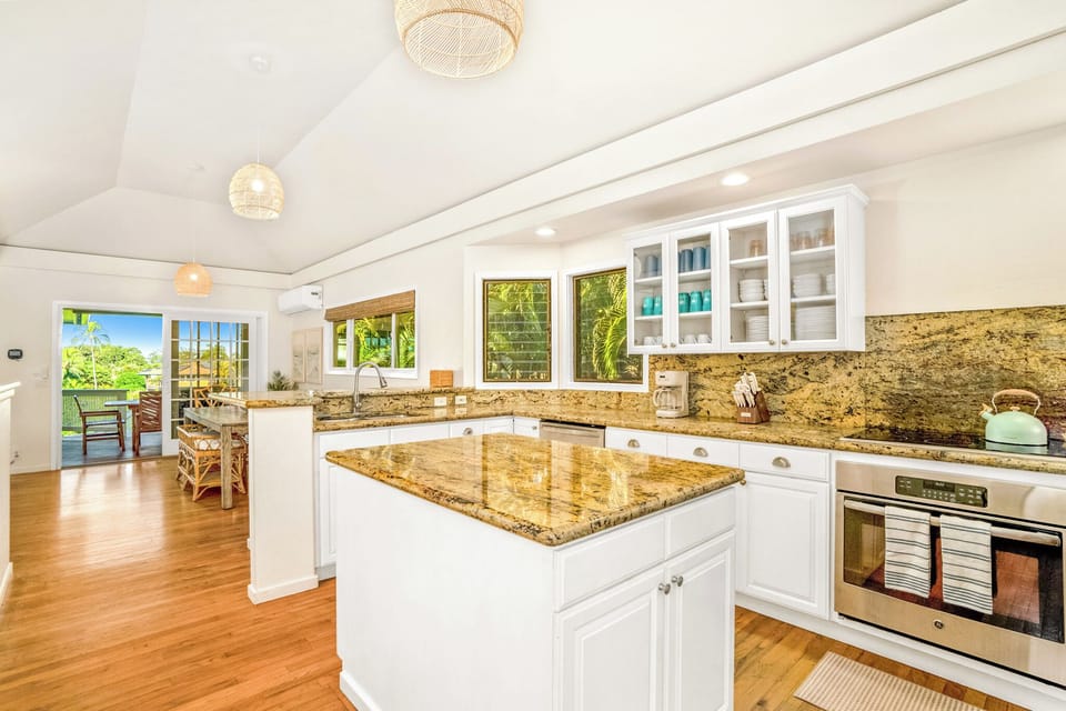 Gather around the island for coffee, cocktails, or conversation in this fully equipped kitchen