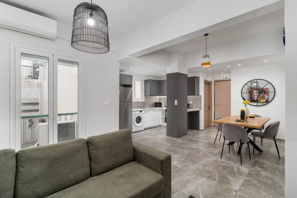 Open layout connecting living, dining, and kitchen areas — ideal for both short and mid-term stays