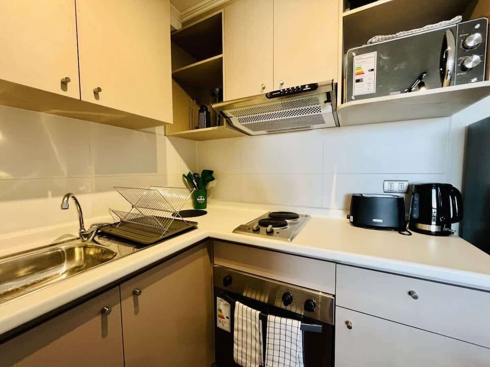 Functional kitchen layout w/ ample counter space for easy meal prep