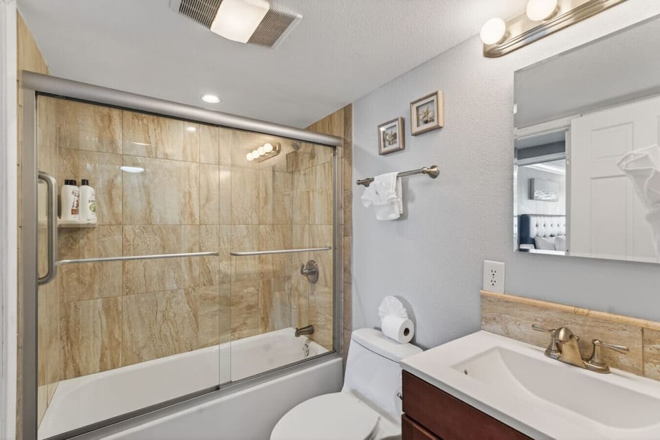 Clean, updated bathroom with full tub and shower.