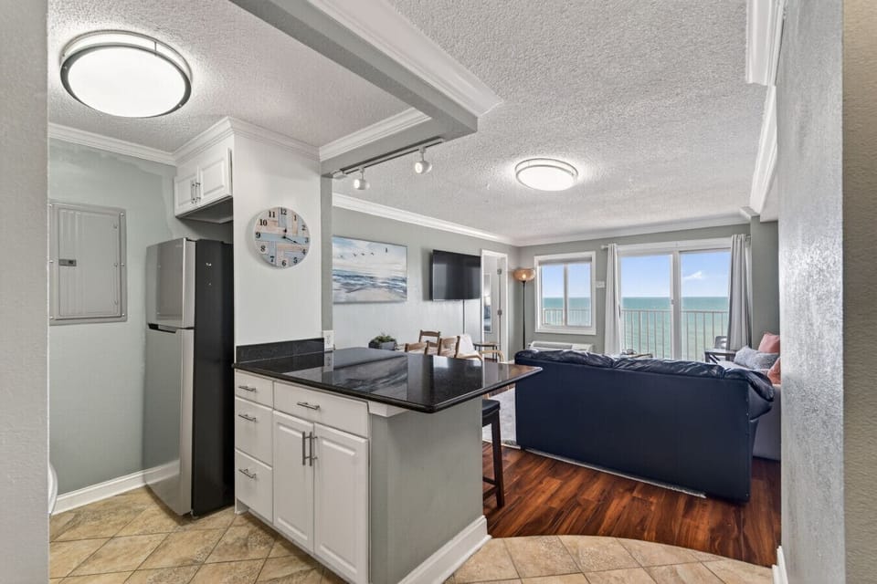 Cook, relax, and enjoy the view all in one space.