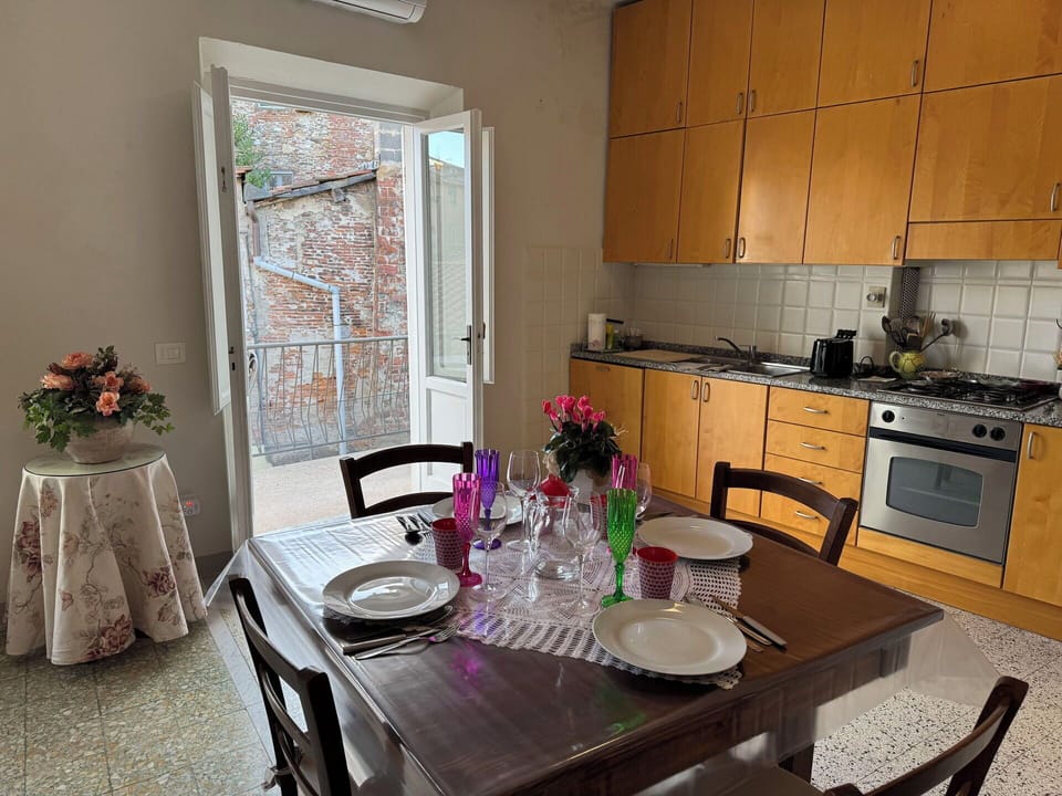 Furniture, Flooring, Wood, Interior Design, Kitchen & Dining Room Table, Dining Room, Floor, Table, Chair, Lighting