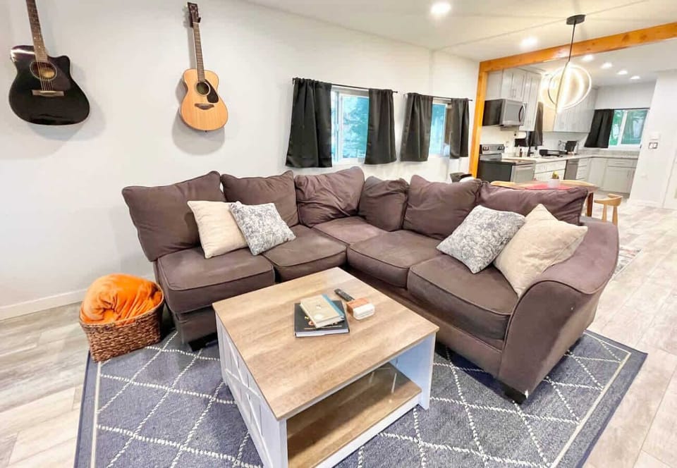 
Settle in for the soundtrack to your getaway. This open-plan space offers plush comfort and easy flow, perfect for strumming, snacking, and soaking it all in.
