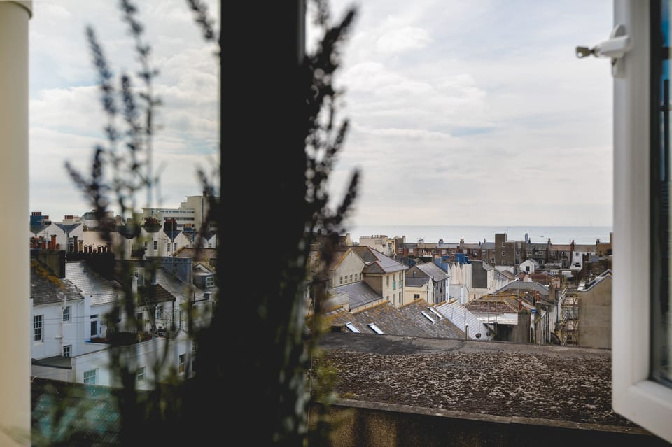 Scenic rooftop view over Brighton rooftops and the sea
