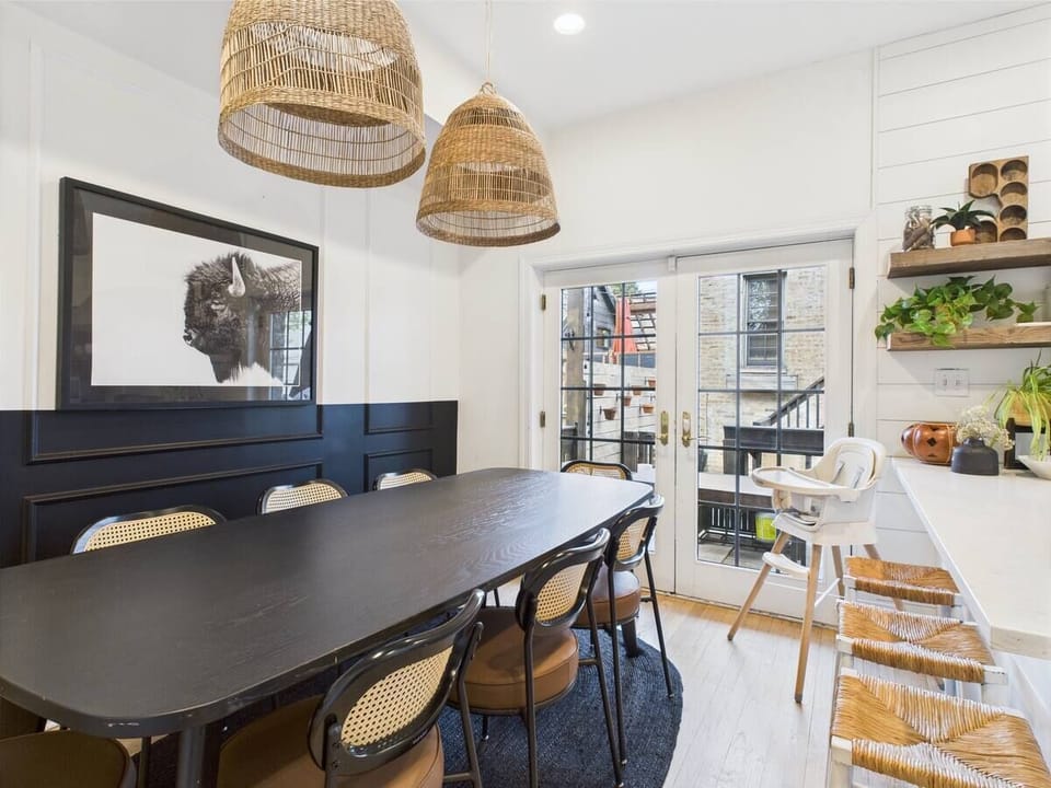 Dining Room: Vibrant space with natural light, modern decor, and stylish seating for memorable meals!