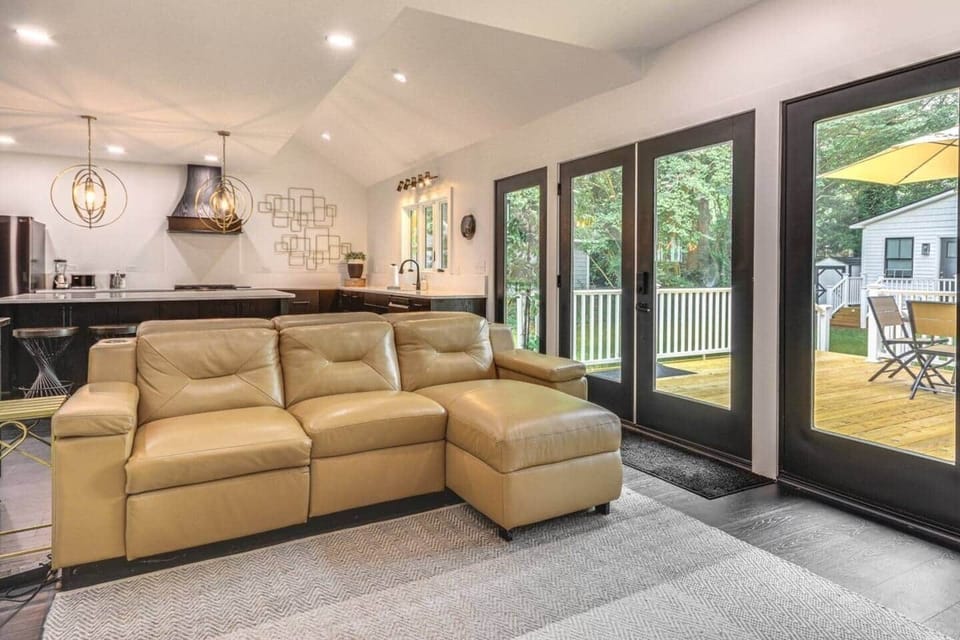 Relax in the family room on the comfortable leather couch while enjoying your favorite movie on the 50-inch TV.