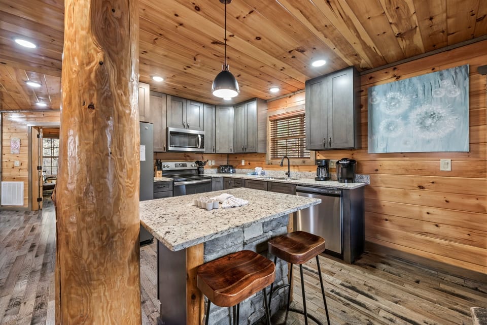 Gather around the bar with comfortable stools for casual meals or morning coffee.