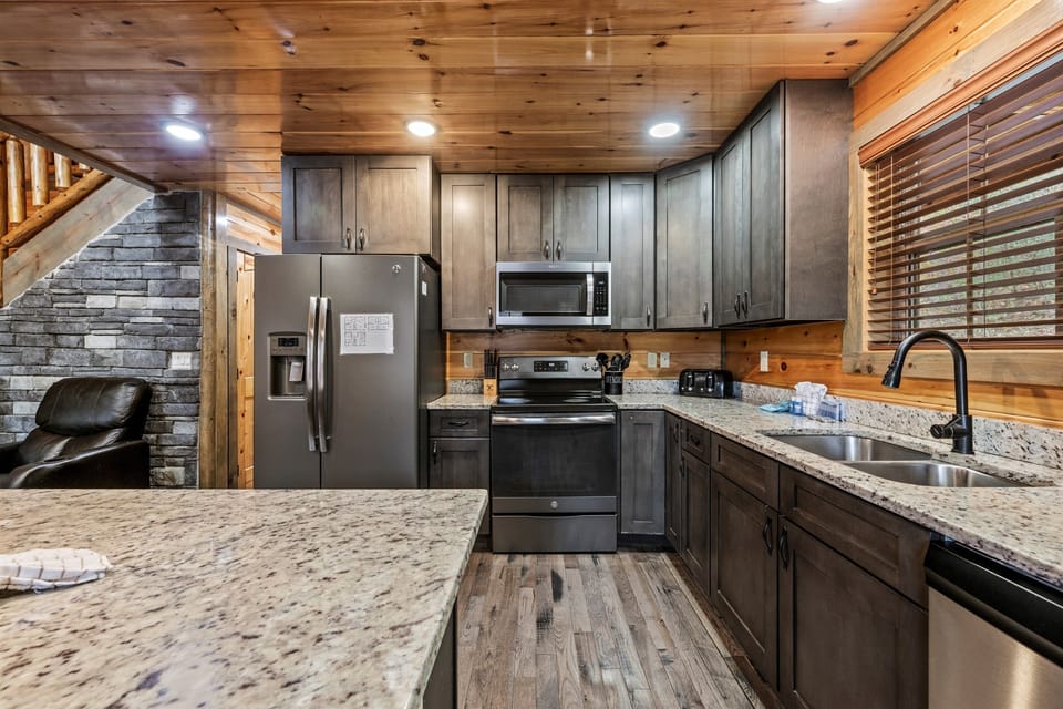 It’s stocked with cookware, utensils, and dinnerware to make meal prep a breeze.