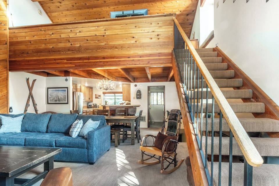 Spacious Living Room with Big Screen TV and Plenty of Seating