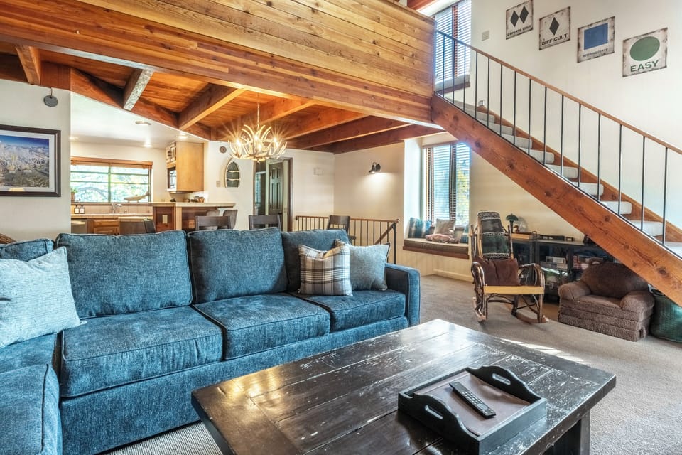 Spacious Living Room with Big Screen TV and Plenty of Seating