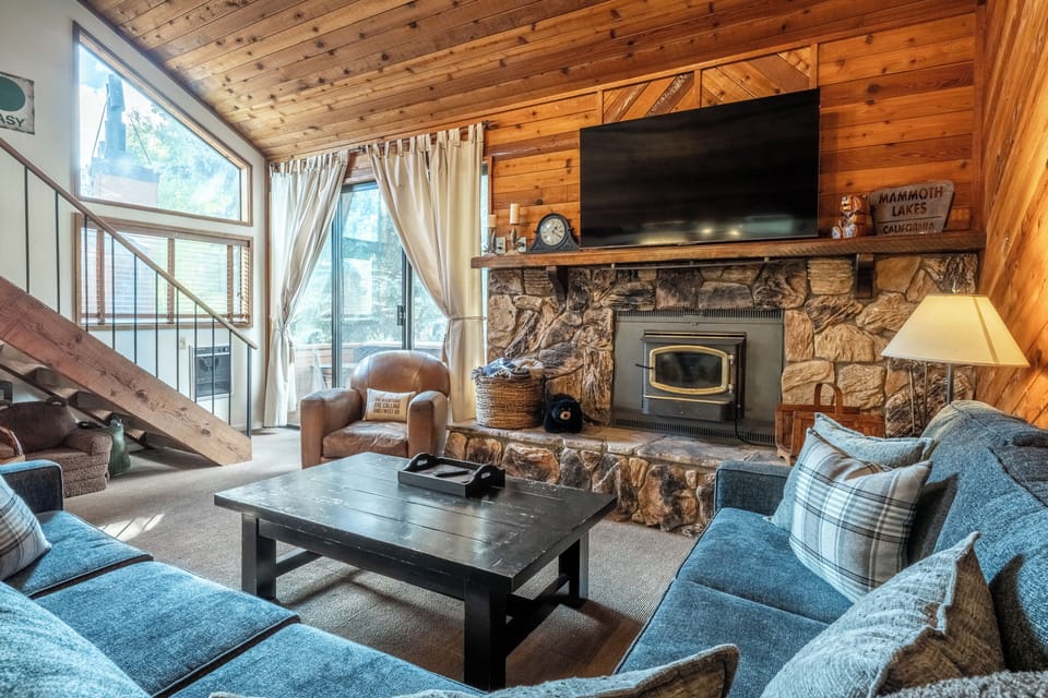 Spacious Living Room with Big Screen TV and Plenty of Seating