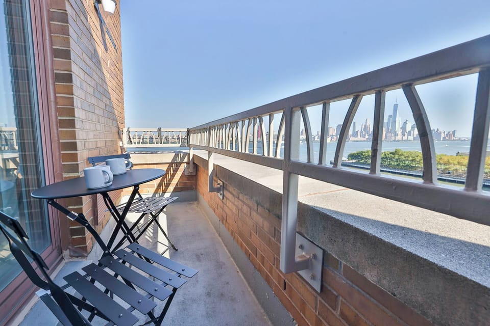 ACCESS TO BALCONY FROM THE  LIVING ROOM. WITH AMAZING VIEWS OF NEW YORK CITY