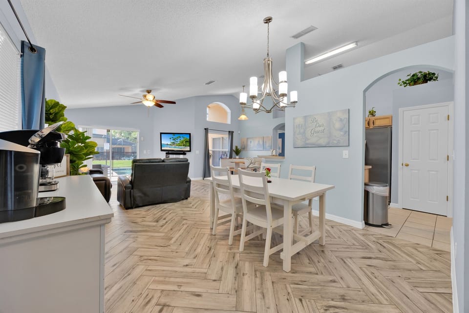 Entry view in Great Room over dining area and living area